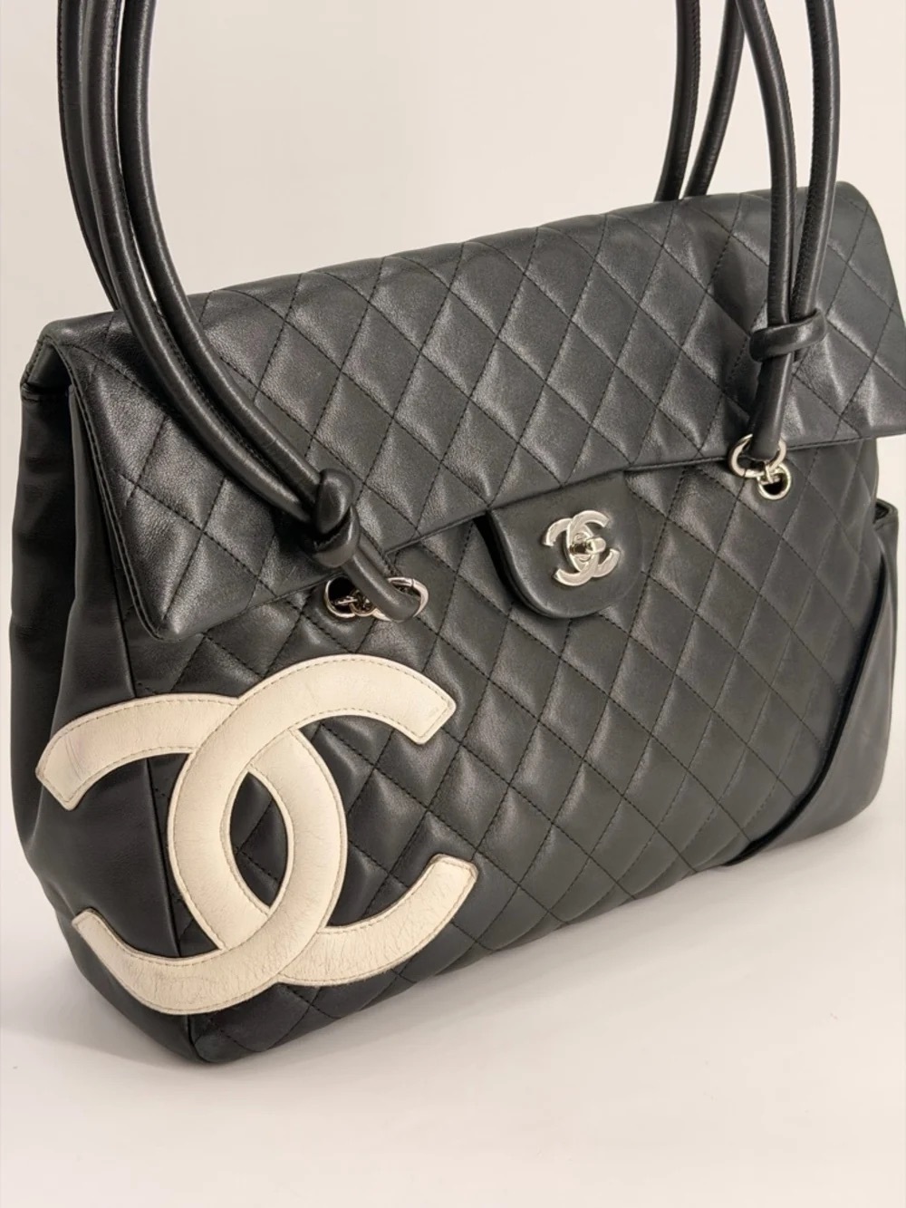 Black Quilted Chanel Leather Top-Handle Bag with Cream CC Patch SEND OFFERS